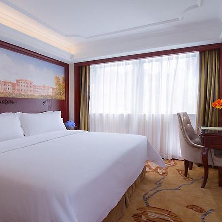 Vienna Hotel Shenzhen Shuiku New Village Exterior photo