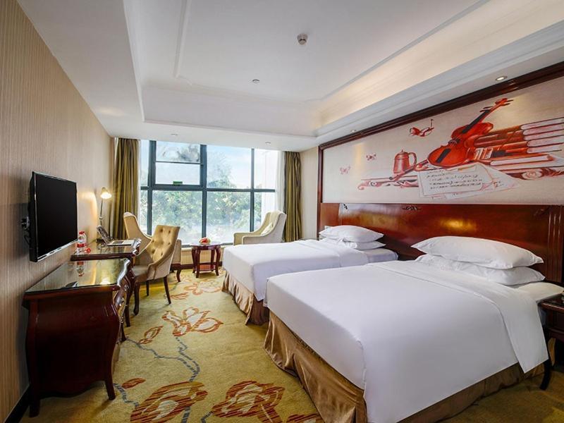 Vienna Hotel Shenzhen Shuiku New Village Exterior photo